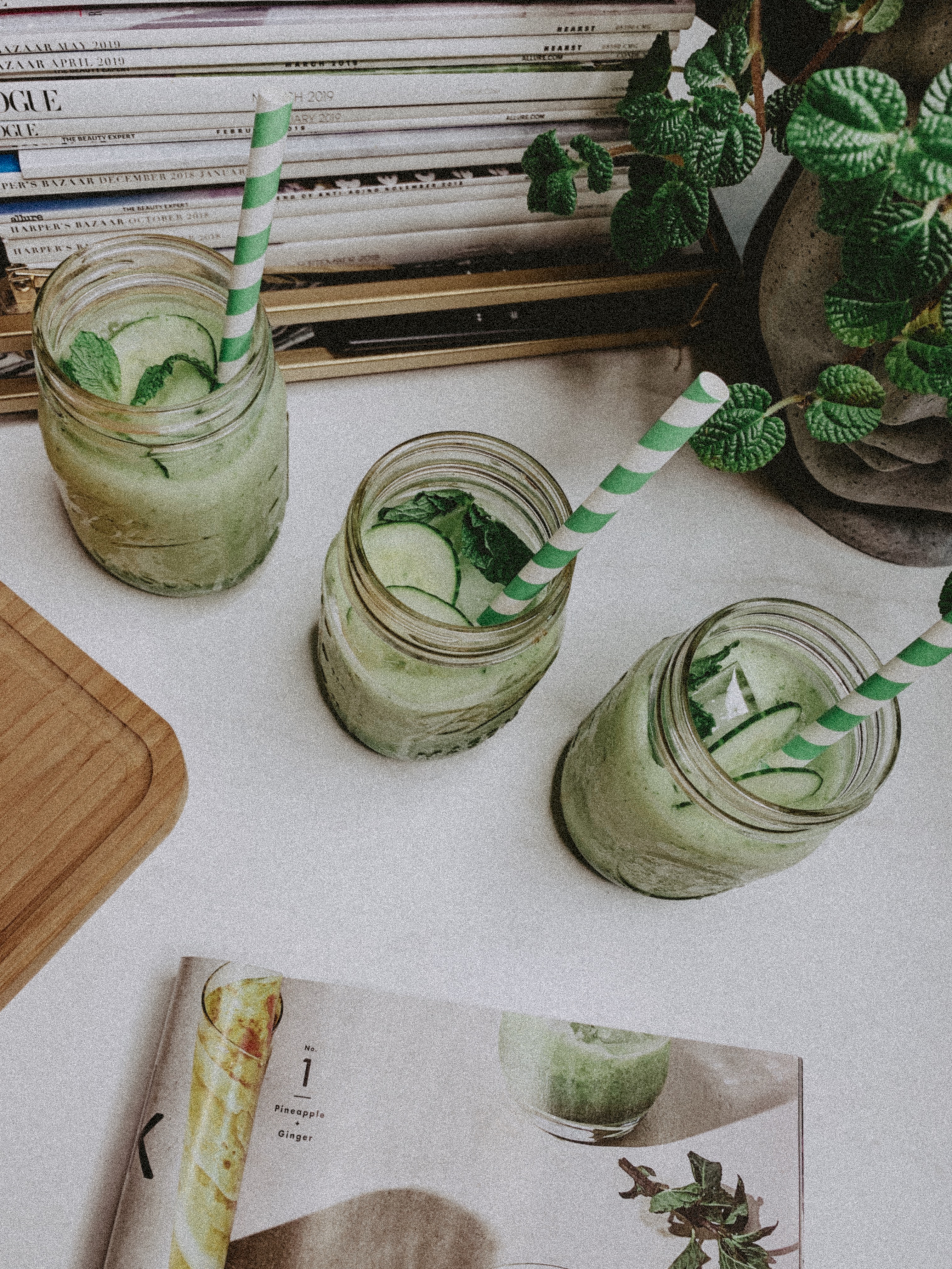 Two Summer Mocktails That Will Leave You Feeling Refreshed- Honeydew Cucumber Mint Mocktail - Simply by Simone #cheers #cocktails #mocktails #drinks #summer #refreshed #blogger #lifestyle #lifestyleblog #lifestyleblogger #cocktail #mocktail #honeydew #paperstraws #decor #flowers #cocktailcourier