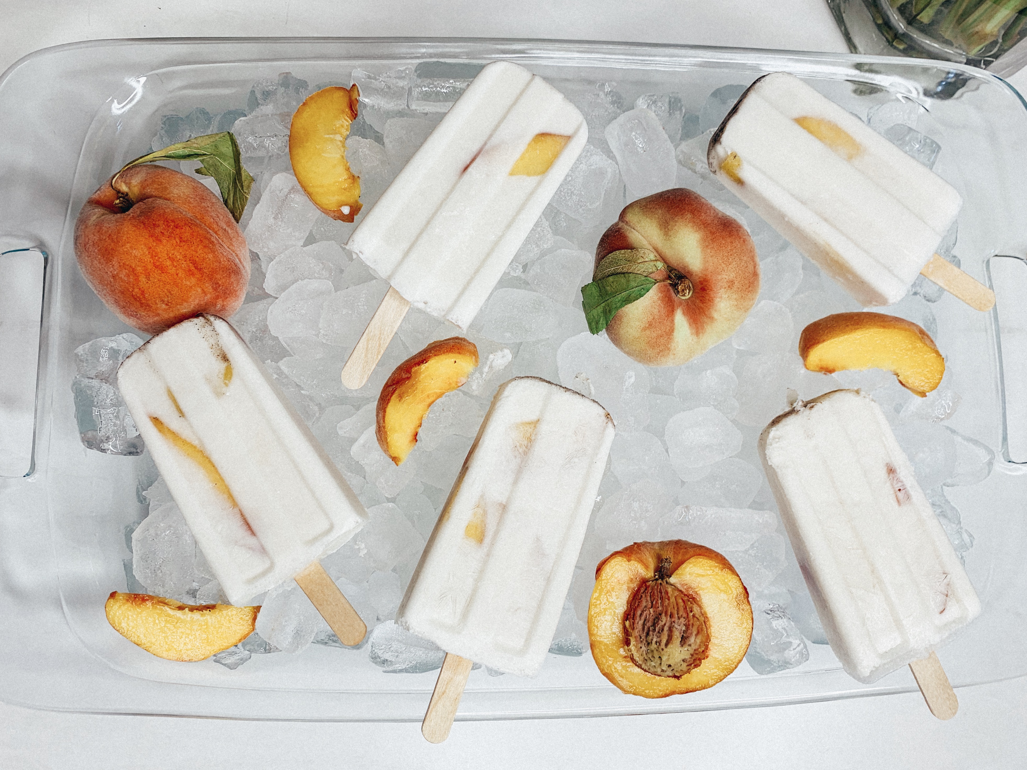 Be The Best Guest - Show Up With These Peach Coconut Ice pops! #icepops #bestguest #dessert #icecream #recipe #healthydessert #food #foodie #eats #peach #coconut #icepop