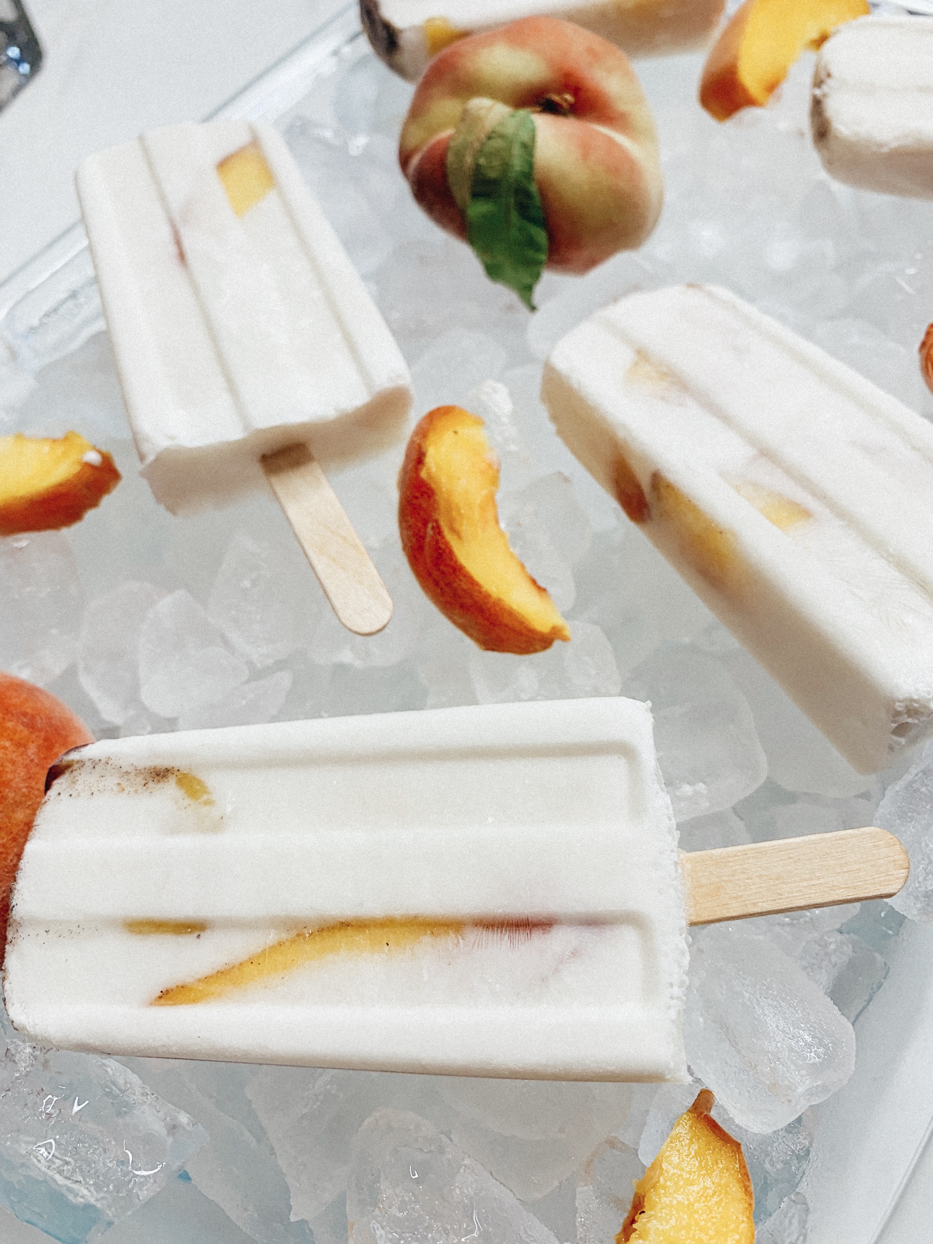 Be The Best Guest - Show Up With These Peach Coconut Ice pops! #icepops #bestguest #dessert #icecream #recipe #healthydessert #food #foodie #eats #peach #coconut #icepop closeup