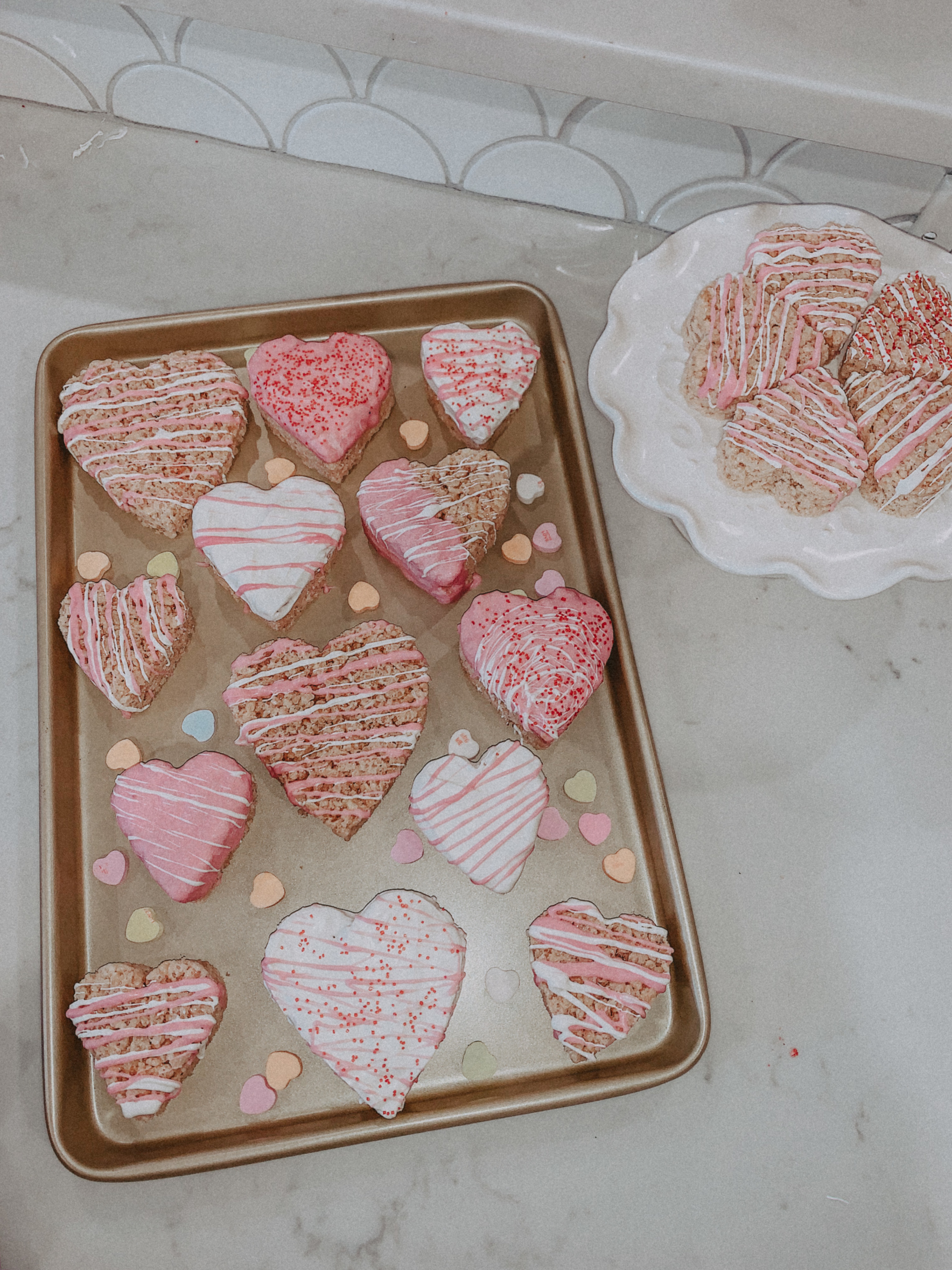 Quick and Easy Valentine's Day Treats for Everyone! - Pink Rice Crispy's - Heart Shaped Rice Crispy's - Marble Countertops - Simply by Simone - Simone Piliero - Galentines Day - YouTube - Vlog - Recipe #recipe #valentinesday #galentinesday #ricecrispy #ricecrispies #valentinesdaytreats #valentinesdayrecipe 