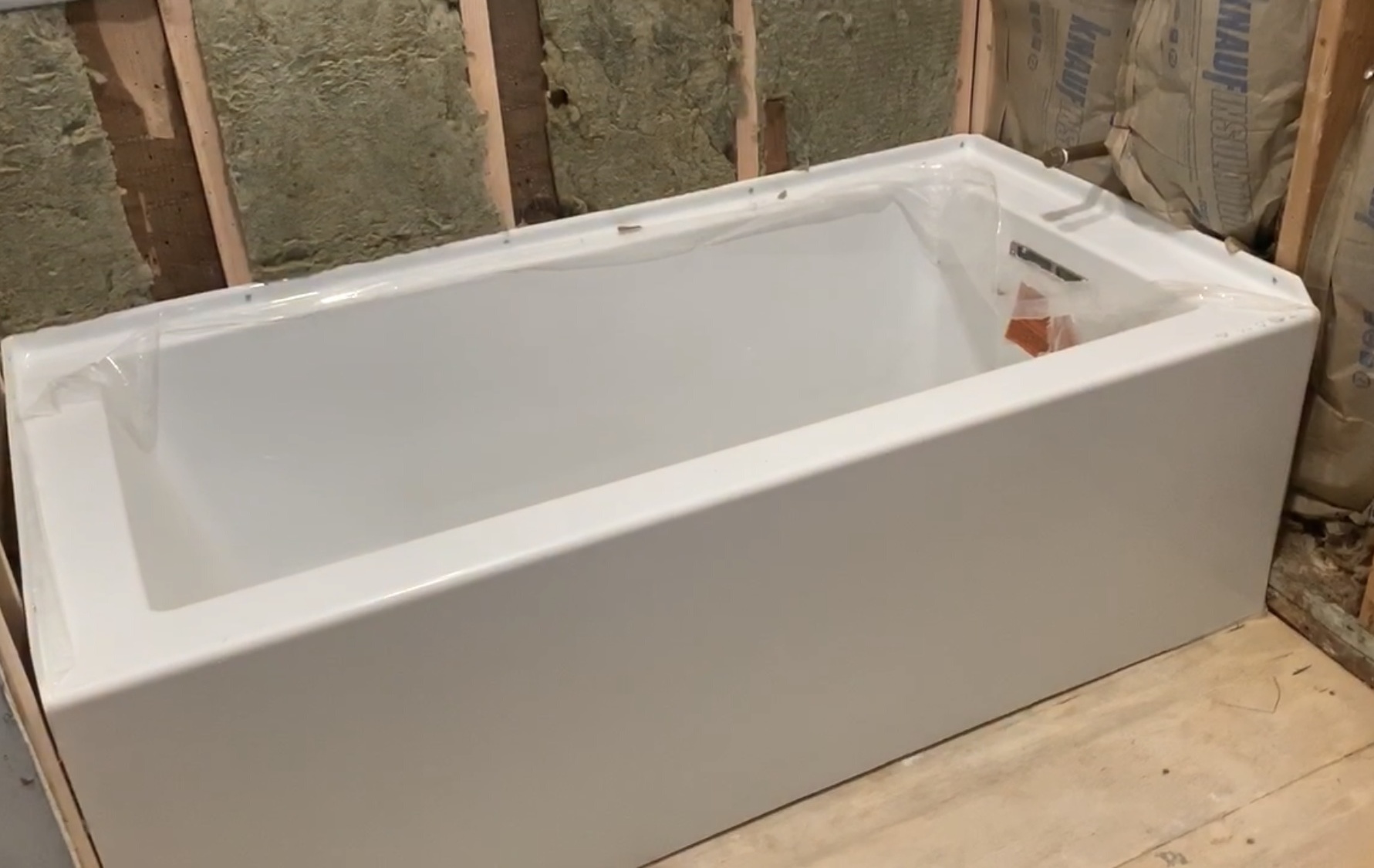 Simply by Simone - Simone Piliero - My Black and White Bathroom Renovation - Tub Installation - #bathroom #home #renovation #bathroomrenovation #diyhome #bathroomtiles #bathroomdecor #bathroomideas #bathroomrenovationideas