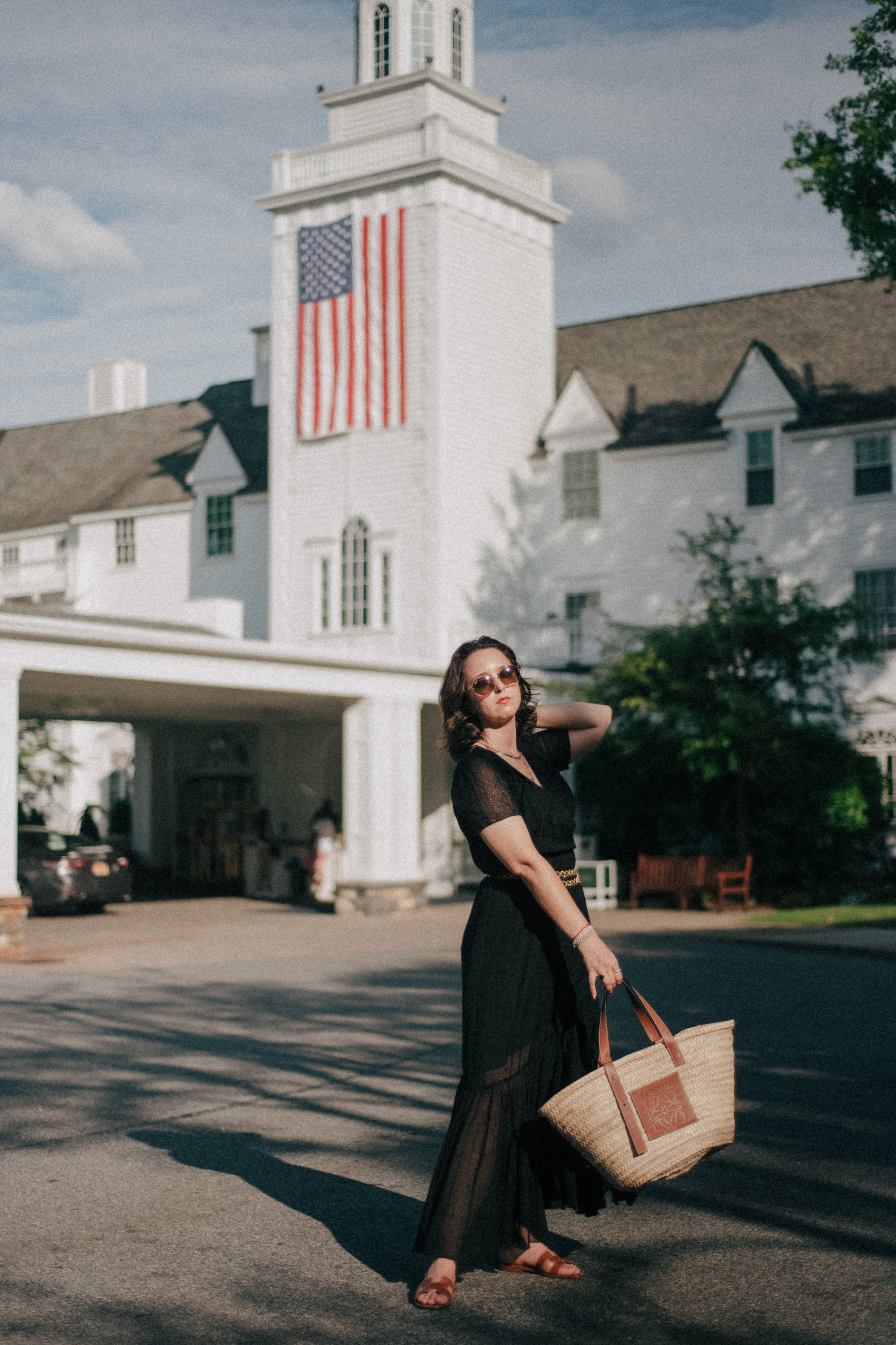 Three Day Getaway to The Sagamore Resort on Lake George New York - Simply by Simone in front of the Sagamore in Black Dress Weekend Review - North East Travel Guide